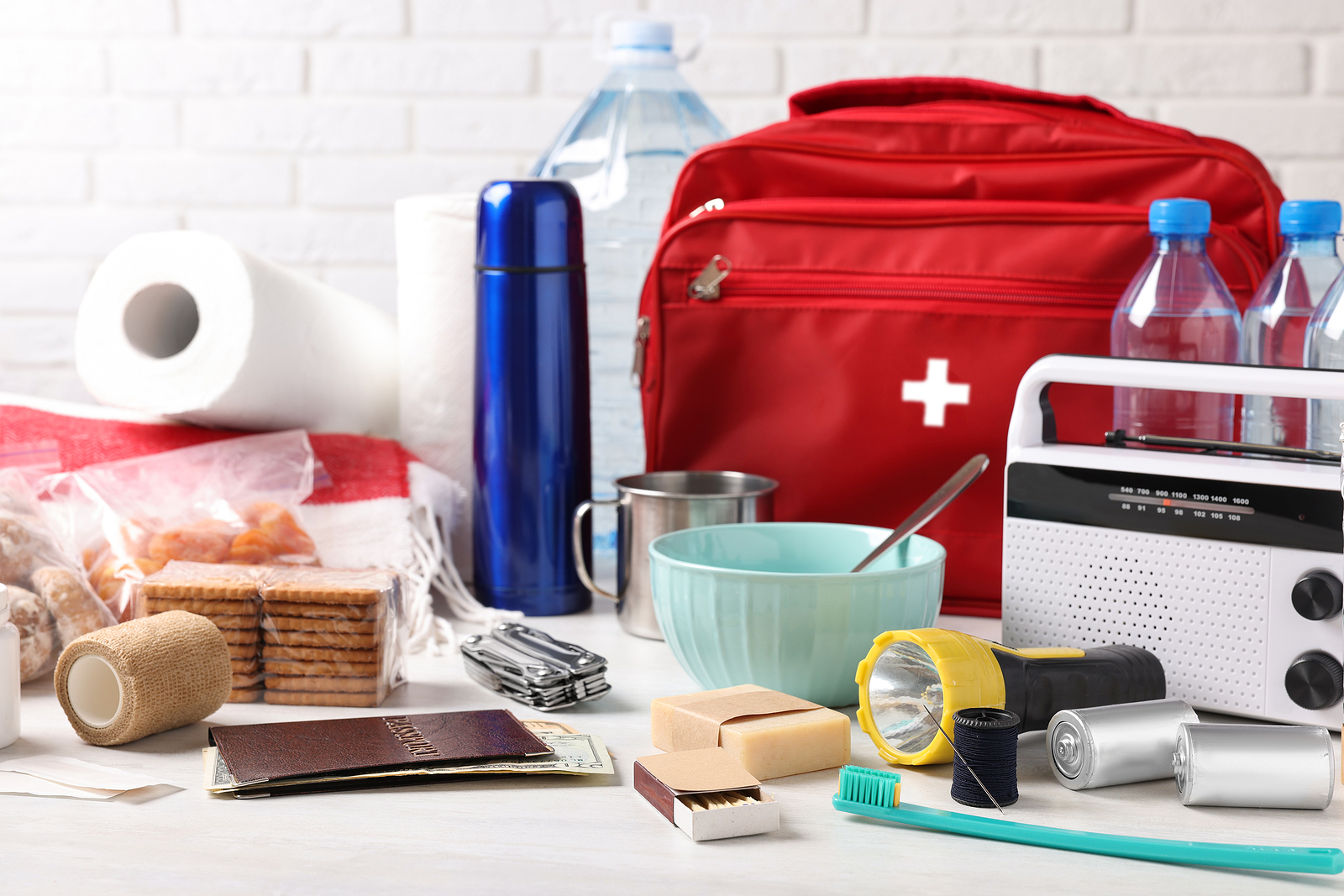 emergency supply lists tp print represented by photo of first aid kit and other list contents